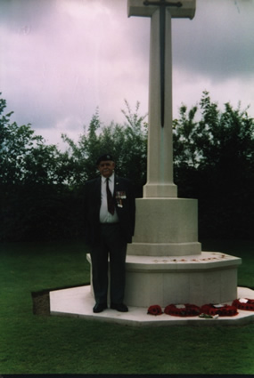 Len Butt, Paying Respect at the Cross of Remembrance "Jerusalem" War Cemetary Normandy June 6th 2004